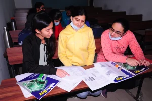 Students participating in a group discussion at WhiteRay Institute on the service page